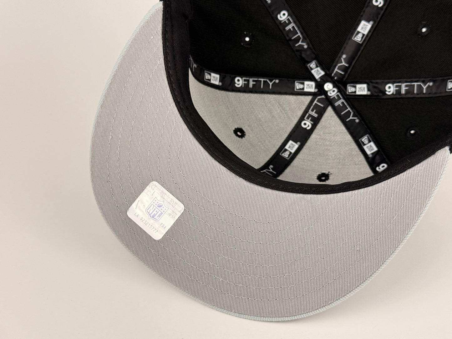 Las Vegas Raiders NFL New Era Cap 9FIFTY Snapback Hat Black Crown Gray Visor