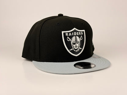 Las Vegas Raiders NFL New Era Cap 9FIFTY Snapback Hat Black Crown Gray Visor