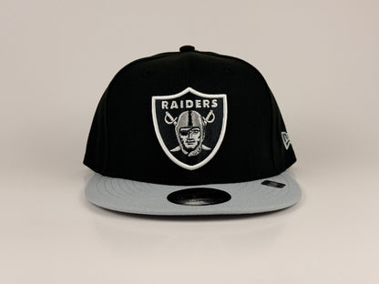 Las Vegas Raiders NFL New Era Cap 9FIFTY Snapback Hat Black Crown Gray Visor
